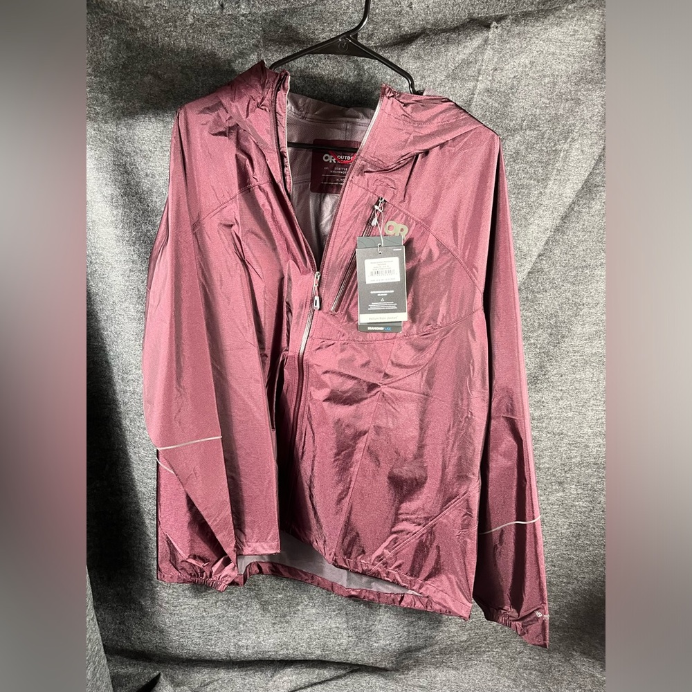 Woman’s Outdoor Research Helium Rain jacket size XL